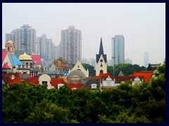 Contrasts: Alp Ice village and Overseas Chinese Town ,Nanshan district skyline seen from Windows of the World.